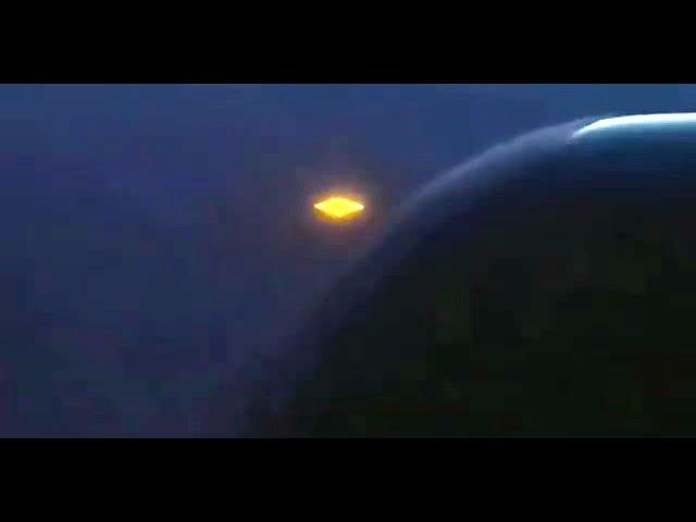 Golden UFO caught on video by plane passenger, plus other amazing sightings